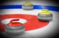 a white floor marked out for floor curling with equipment. 